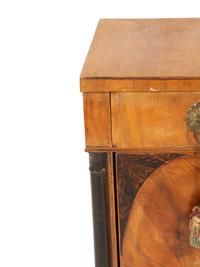 A Northern Italian Walnut and Ebonized Bedside Cabinet