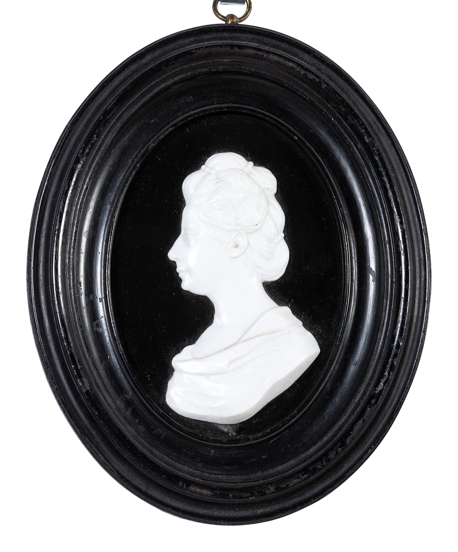 Two English White Paste Silhouette Bust Portraits of a Lady and a Gentleman