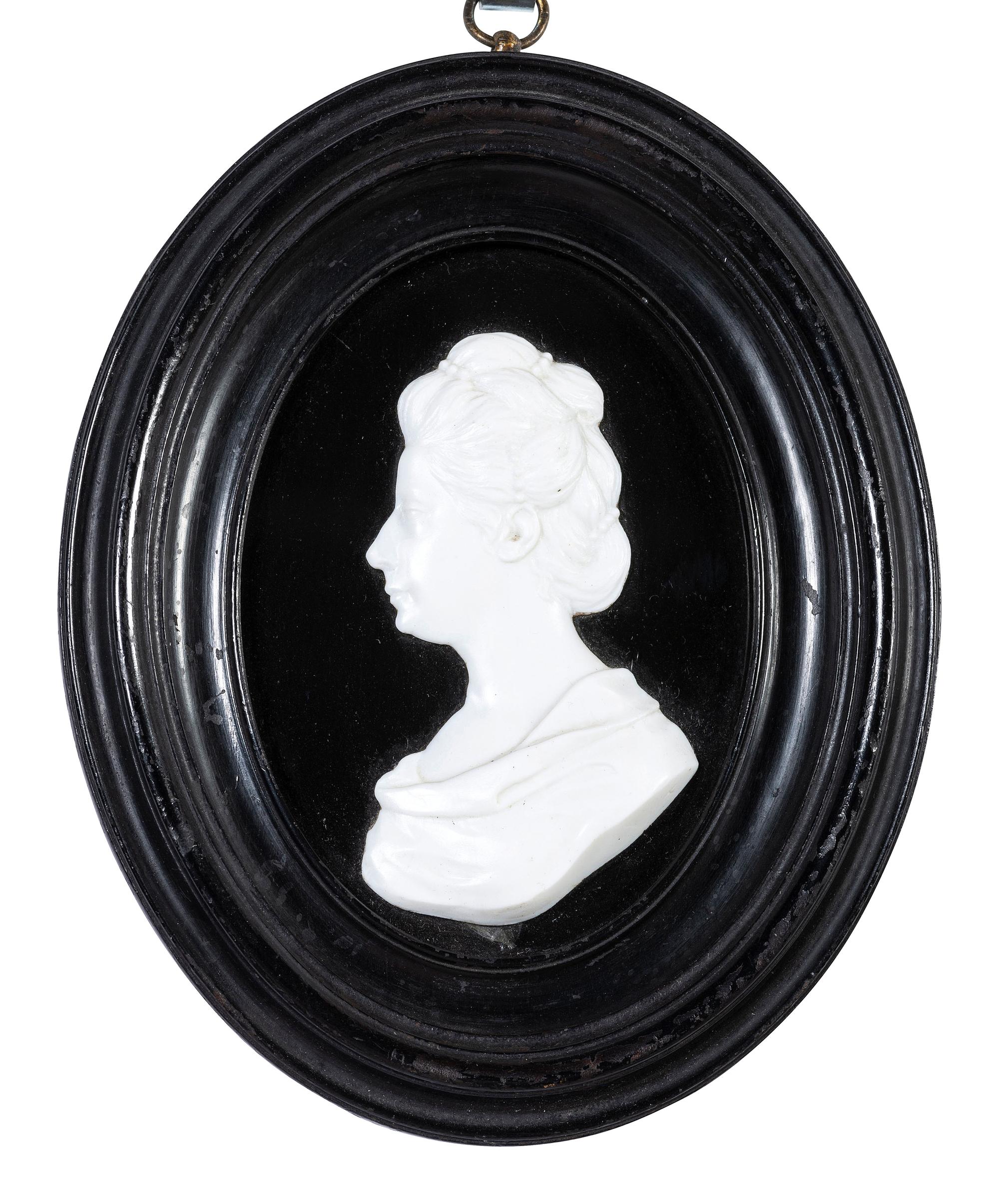 Two English White Paste Silhouette Bust Portraits of a Lady and a Gentleman