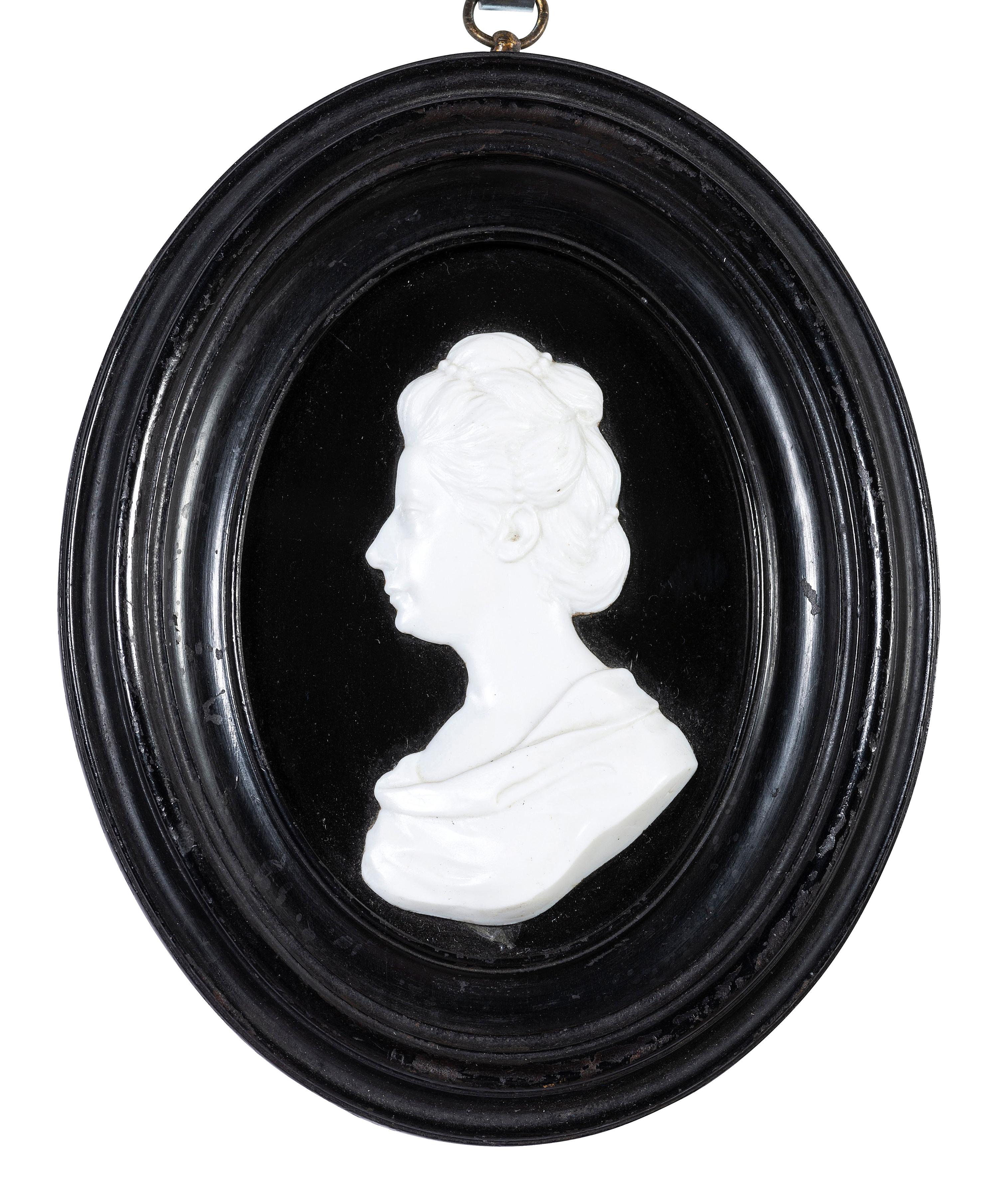 Two English White Paste Silhouette Bust Portraits of a Lady and a Gentleman