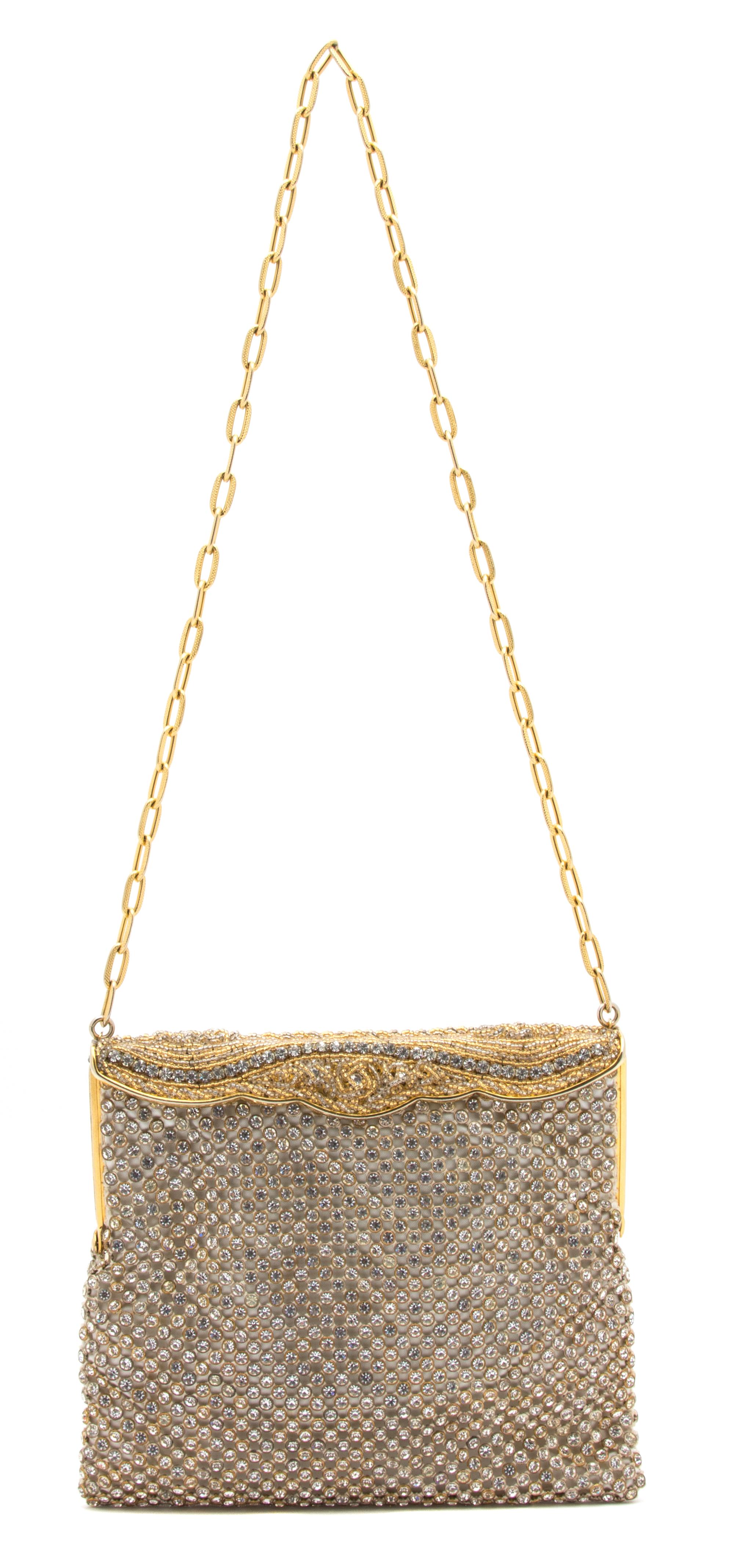 A Goldtone and Rhinestone Evening Bag, 7" x 6" x .25".