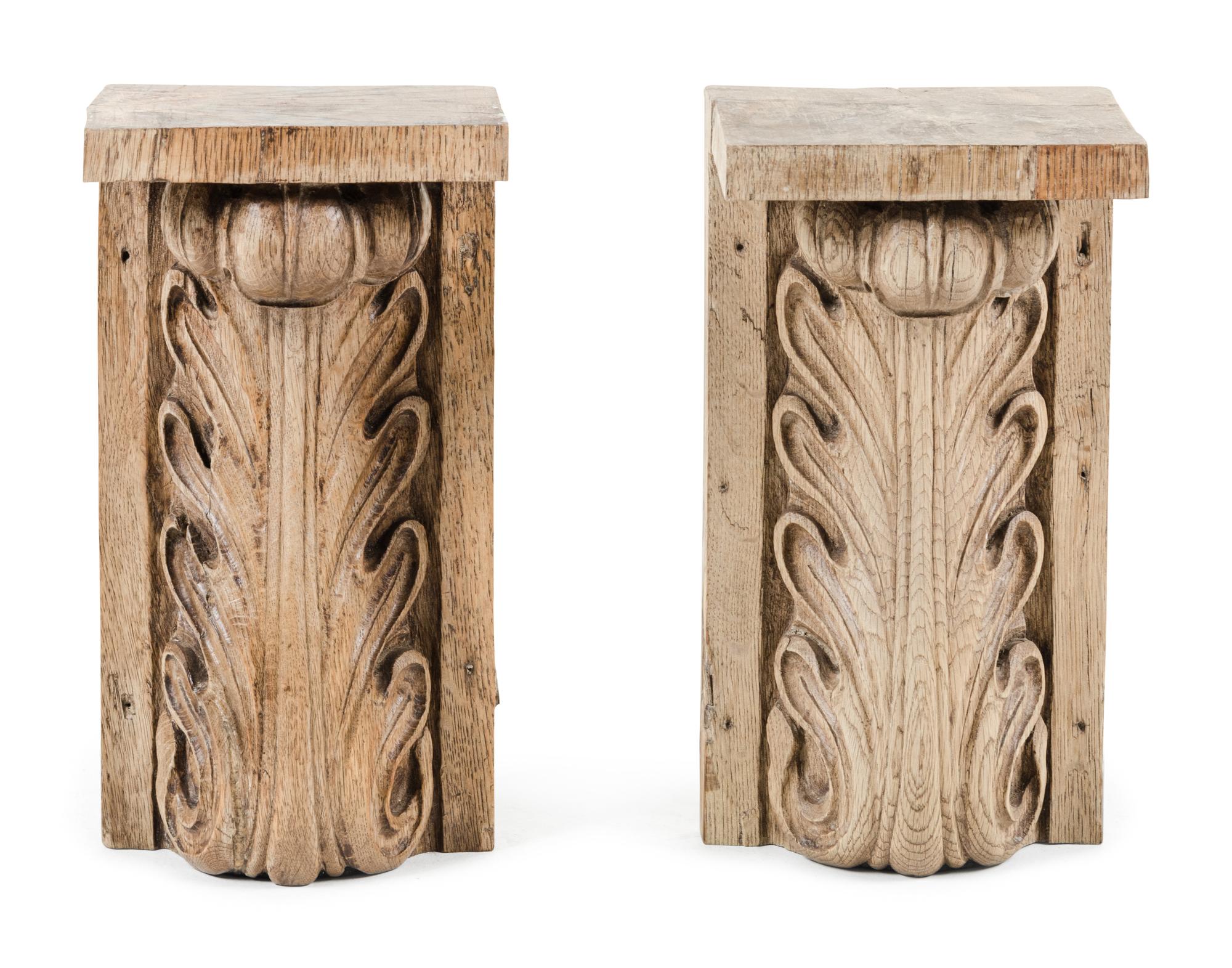 A Pair of Continental Carved Oak Brackets