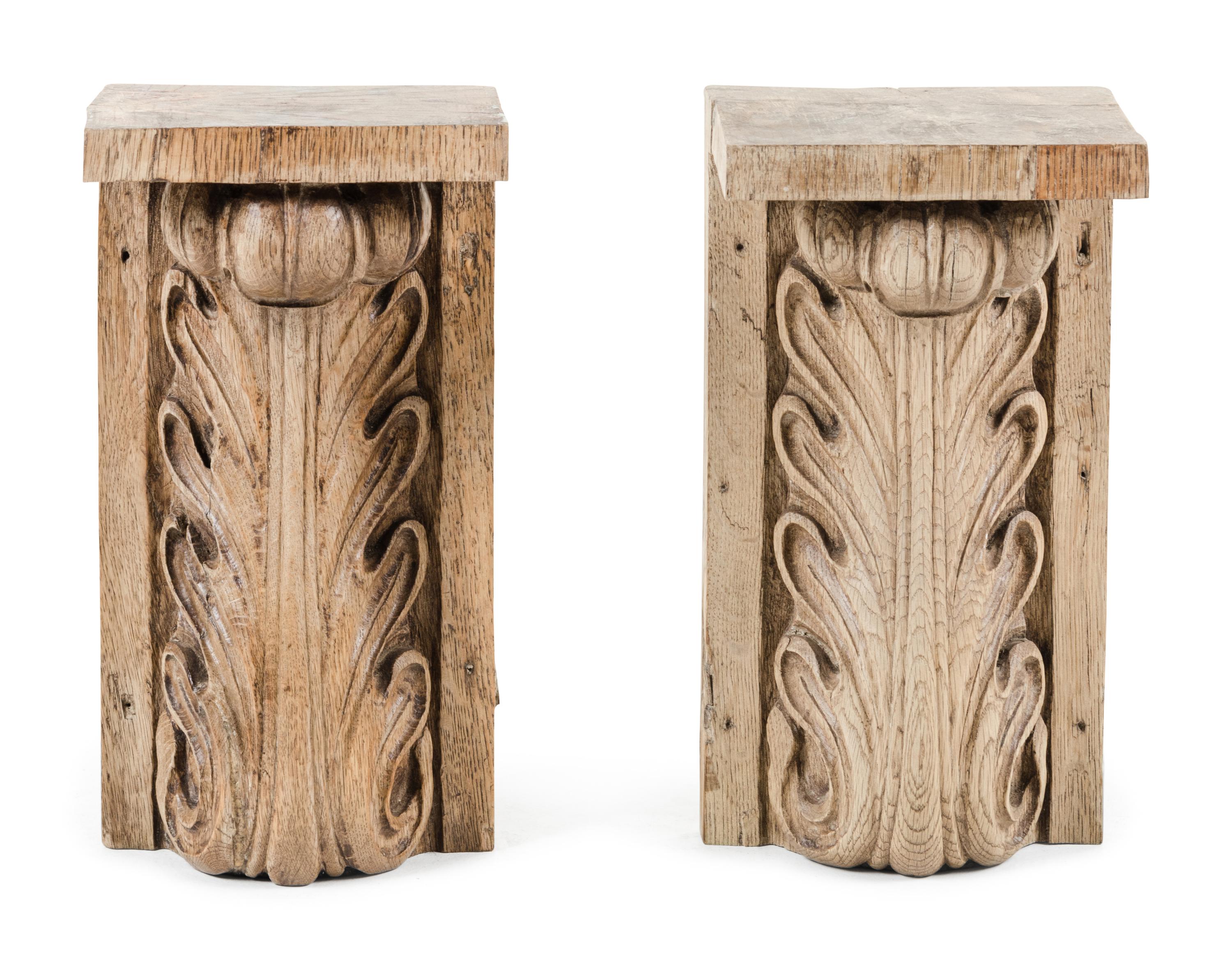 A Pair of Continental Carved Oak Brackets
