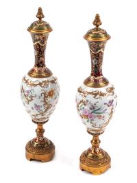 A Pair of French Porcelain, Gilt Bronze and Champlevé Urns