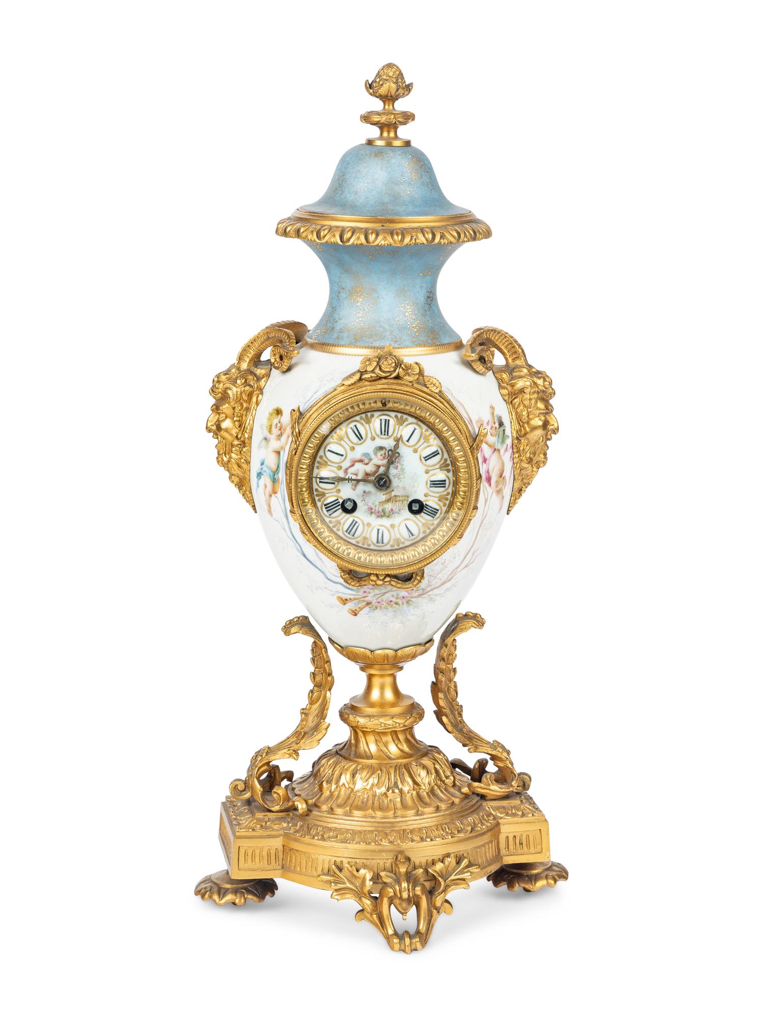 A French Gilt Bronze and Porcelain Urn-Form Clock
