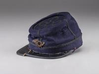 [CIVIL WAR]. Private purchase officer's sack coat, kepi, and carpet bag identified to Lieutenant Albert C. Sparks, Co. B, 37th Massachusetts Volunteers.