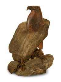 A Natural Stone and Patinated Bronze Figure of an Eagle