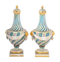 A Pair of Sèvres Style Porcelain Covered Vases
