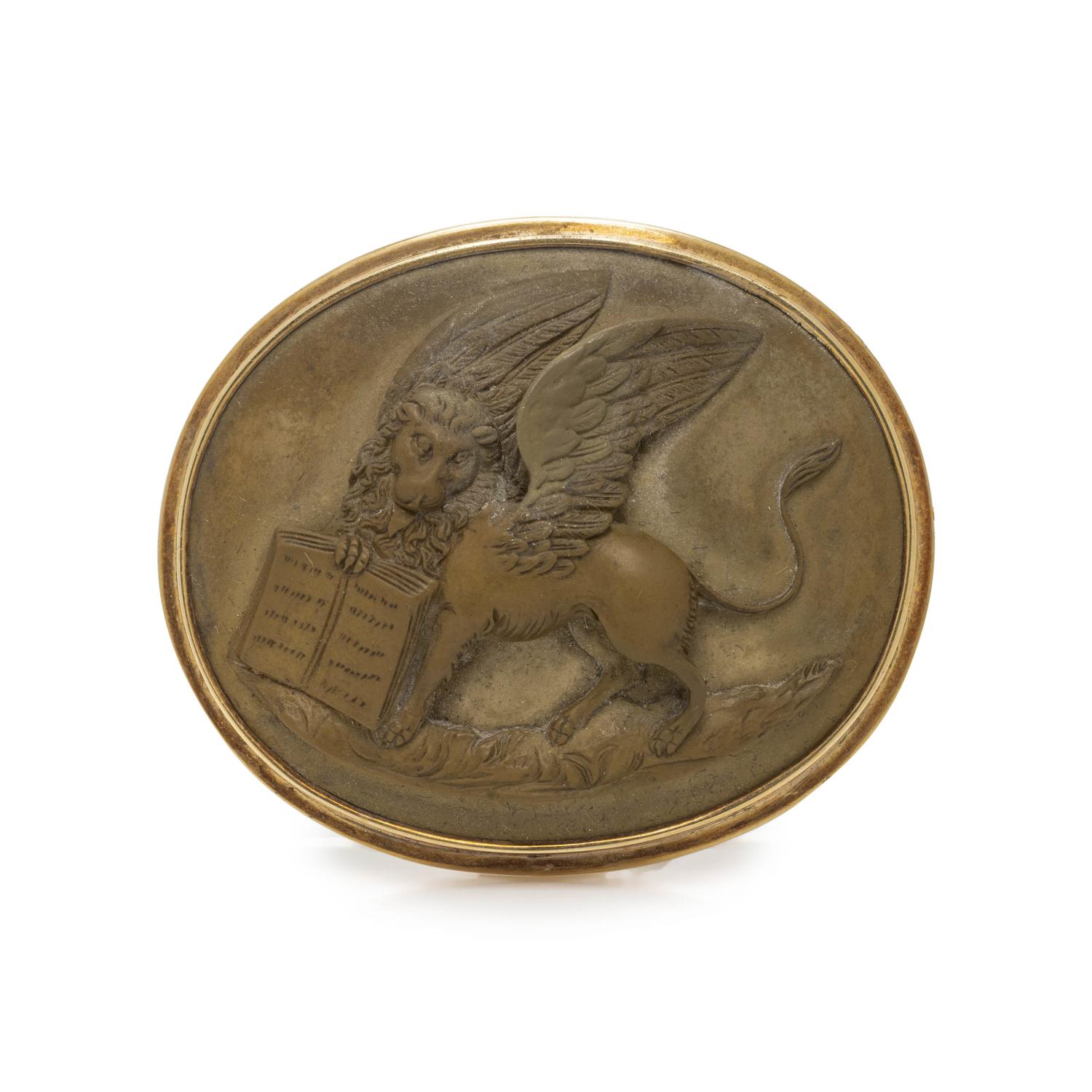YELLOW GOLD AND LAVA CAMEO BROOCH