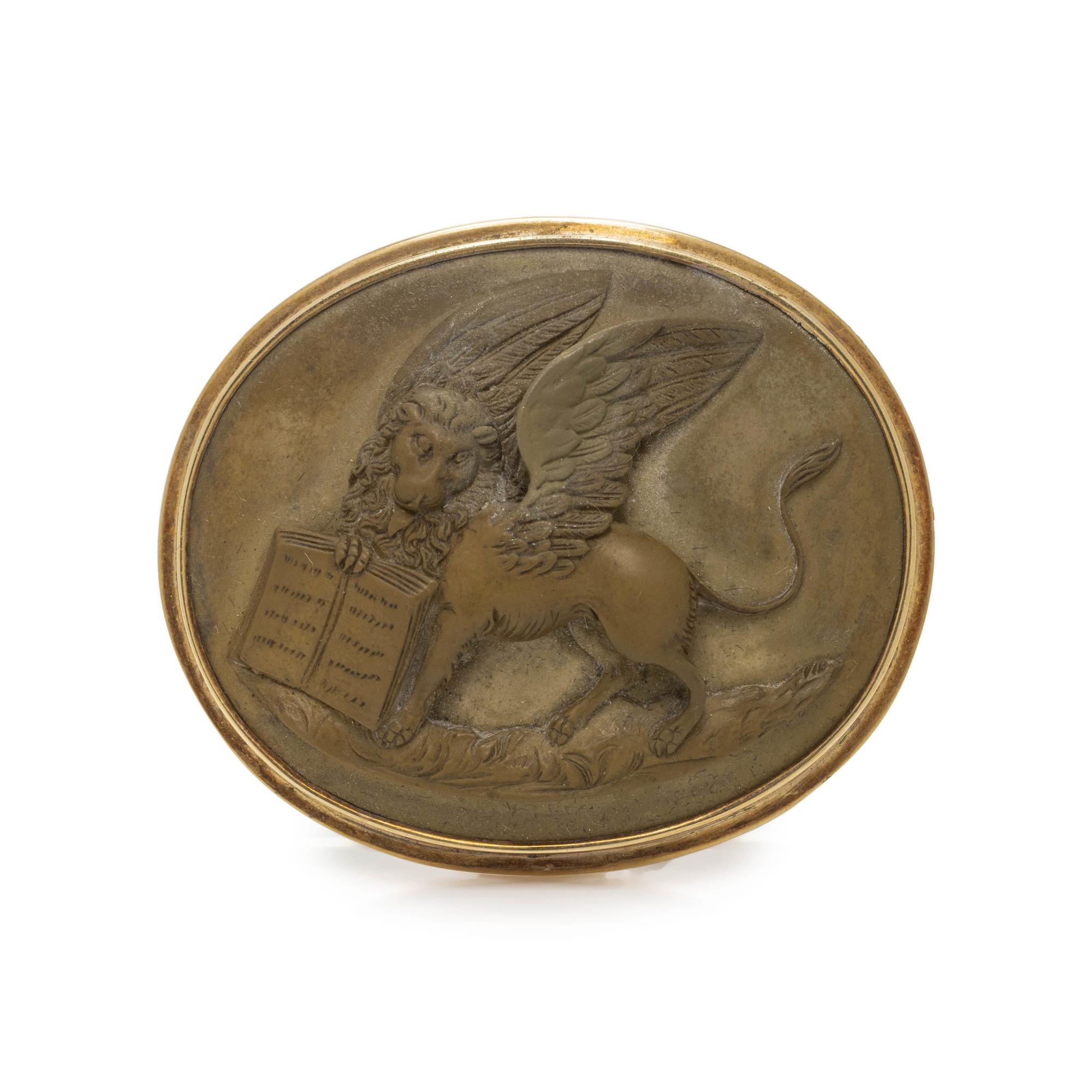 YELLOW GOLD AND LAVA CAMEO BROOCH