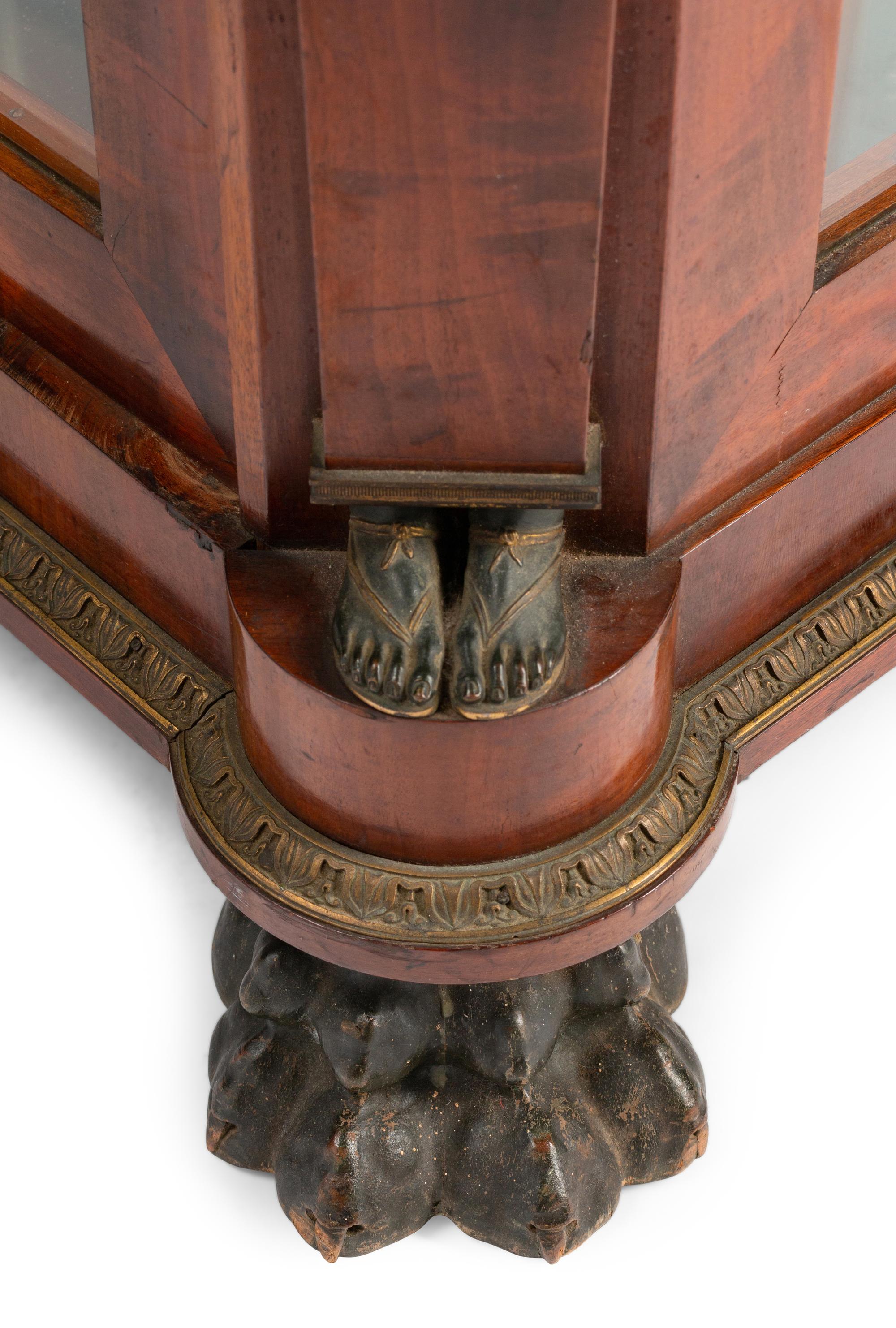 An Empire Egyptian Revival Style Gilt and Patinated Bronze Mounted Mahogany Cabinet