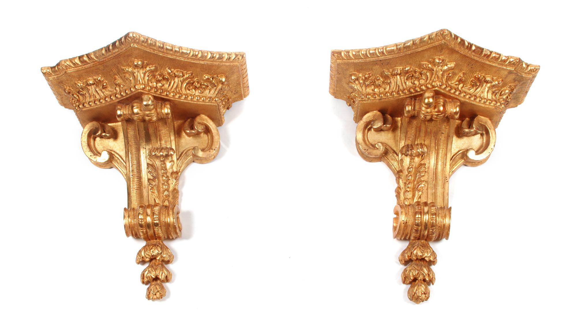 A Pair of French Giltwood Wall Brackets Height 19 x width 17 1/2 x depth 10 inches.
