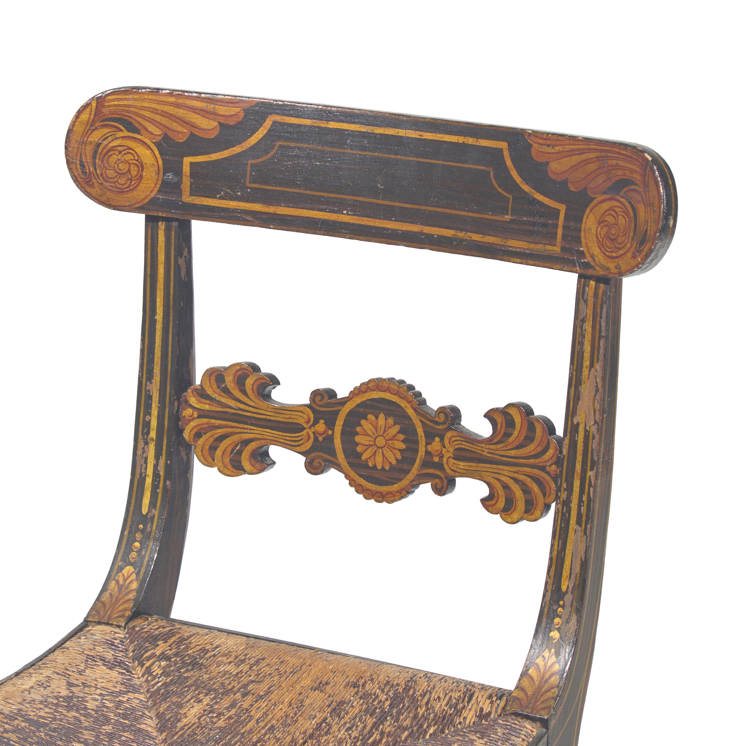 A Set of Four Classical Parcel-Gilt, Grain-Painted and Stenciled Rush-Seat Side Chairs