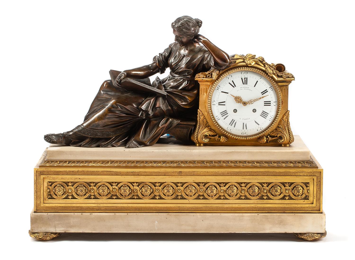 A Large Louis XVI Style Gilt, Patinated Bronze and Marble Clock Width 26 3/4 inches. — 19TH CENTURY