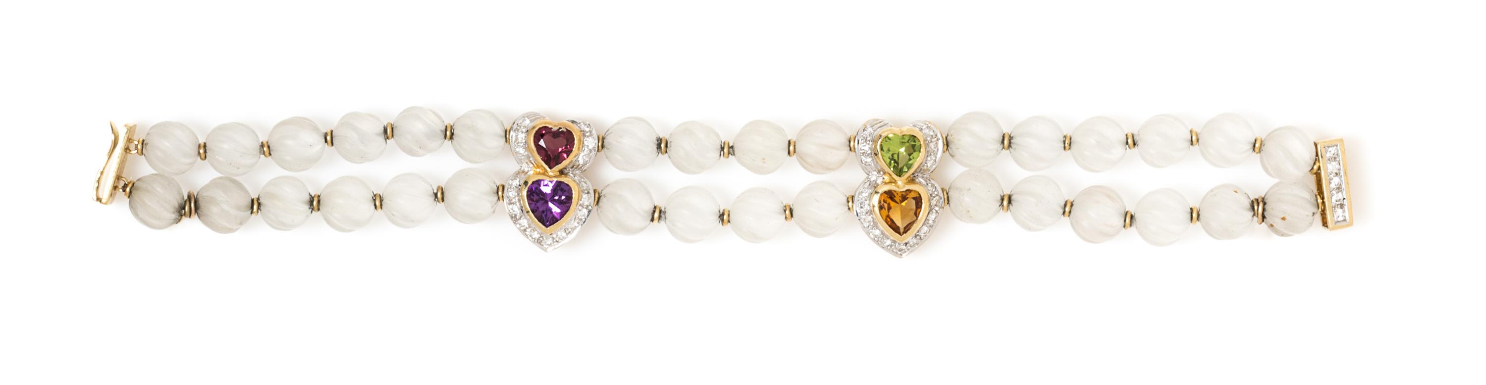 An 18 Karat Yellow Gold, Rock Crystal, Diamond and Multigem Bracelet, 19.20 dwts.