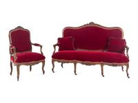 An Italian Louis XV Style Carved and Parcel Gilt Walnut Parlor Suite