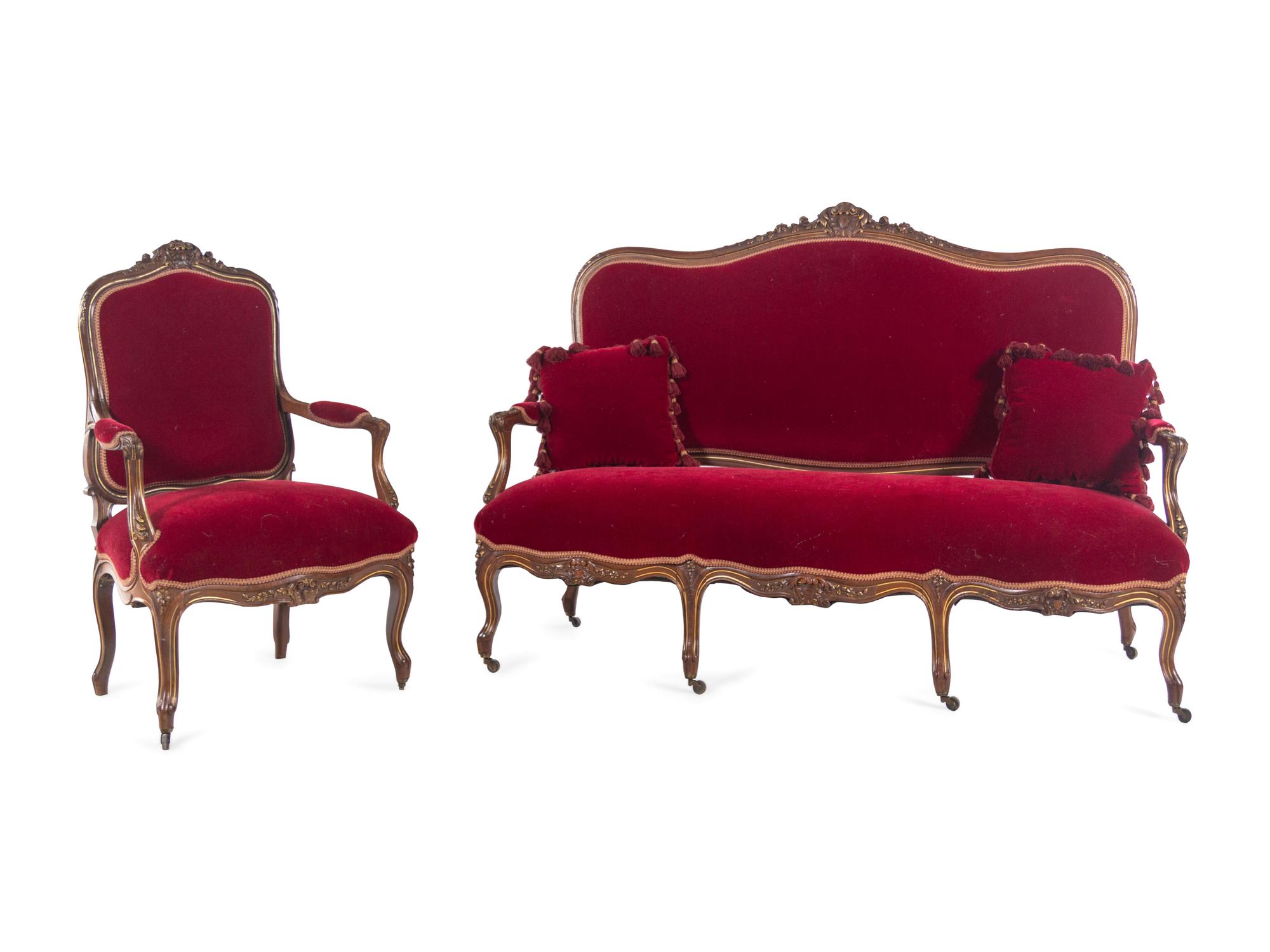 An Italian Louis XV Style Carved and Parcel Gilt Walnut Parlor Suite