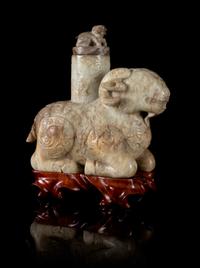 A Chicken Bone Jade Archaistic Ram-Form Vessel