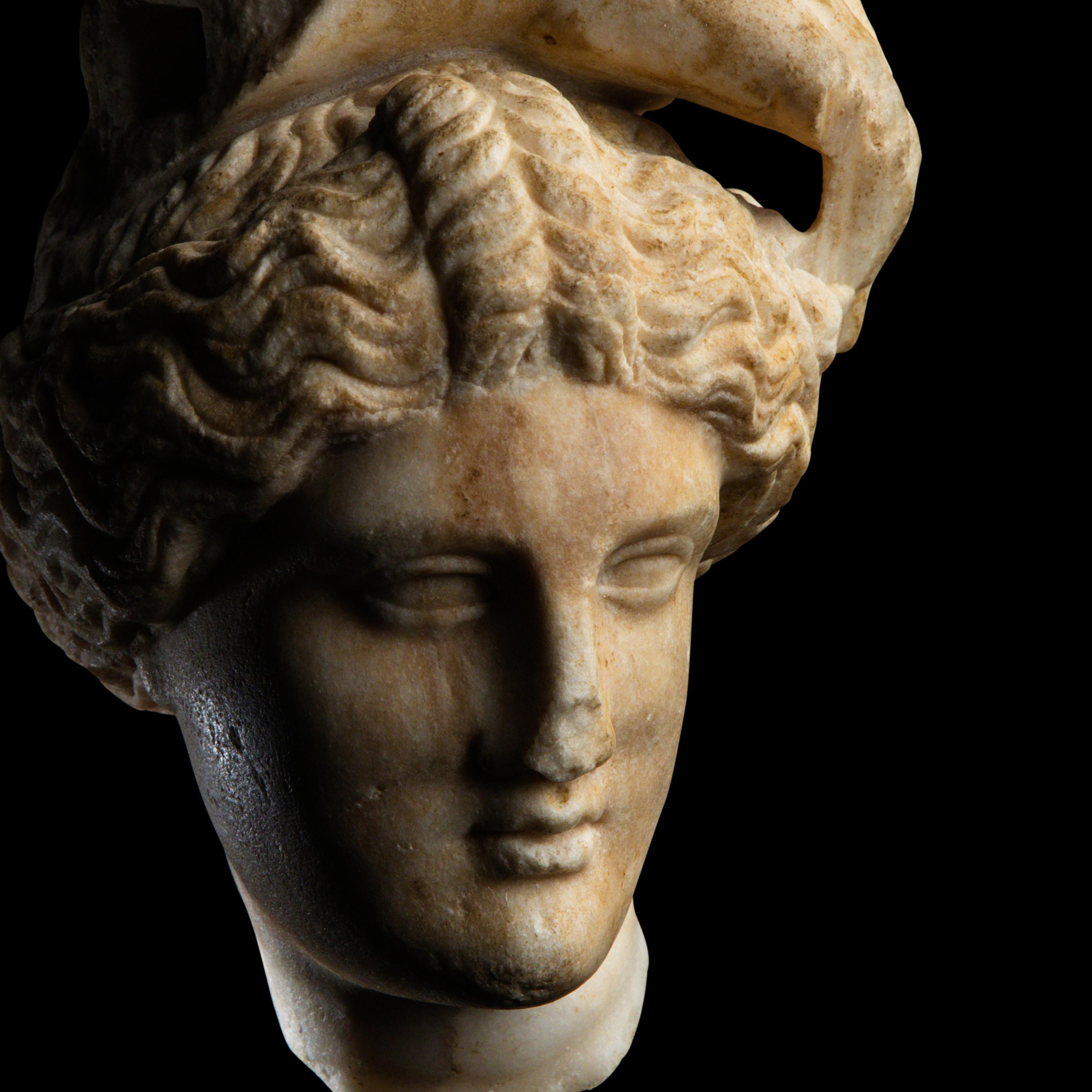 A Roman Marble Head of Apollo Lykeios