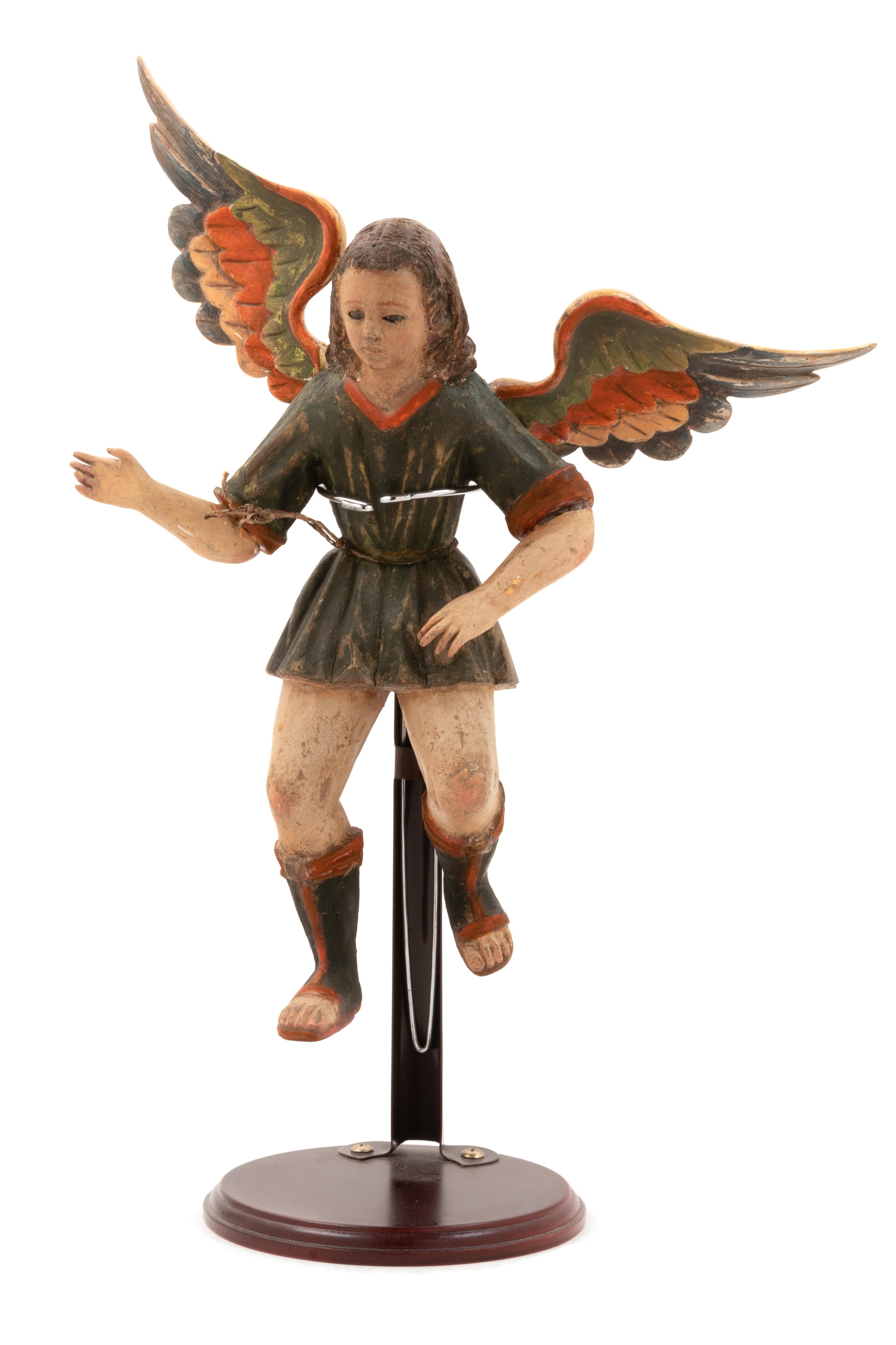 A Continental Carved Polychrome Figure