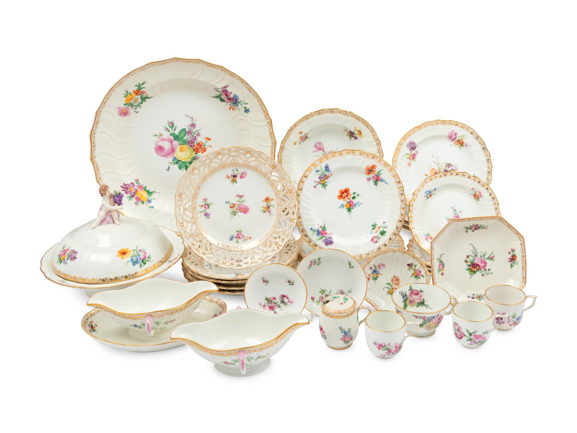 A Berlin (K.P.M.) Porcelain Dinner Service