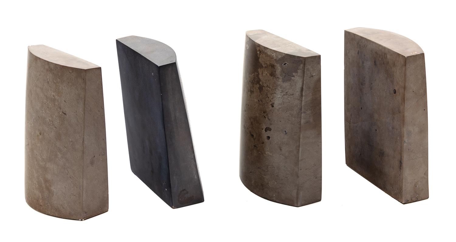 [BOOKENDS]. Two pair of grey soapstone bookends. Height of each, 8-in.