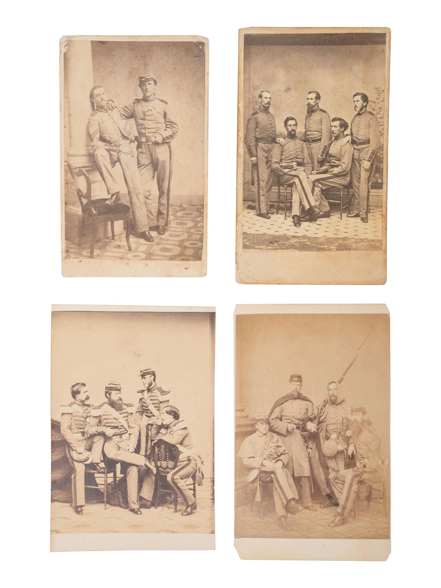 [CIVIL WAR]. 7 CDVs featuring formal and playful studio portraits of 7th New York State Militiamen.