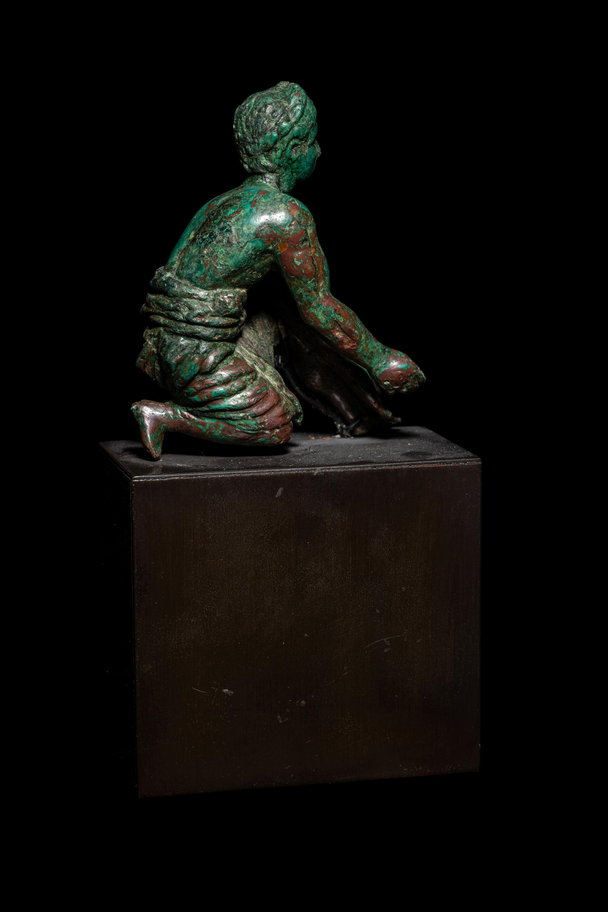 A Roman Bronze Kneeling Priest