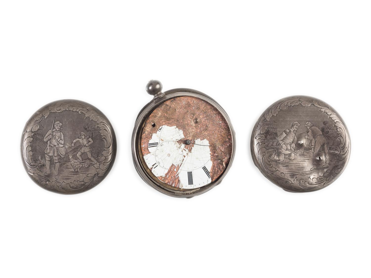 Corporal William L. Miller, Company G, 7th Indiana Volunteers. Bullet-struck pocket watch carried at the Battle of the Wilderness, which saved his life, with original bullet that almost ended it. May 1864.