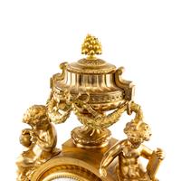 A Louis XVI Style Gilt Bronze Mantel Clock