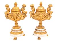 A Pair of Louis XVI Style Gilt Bronze and Marble Covered Urns