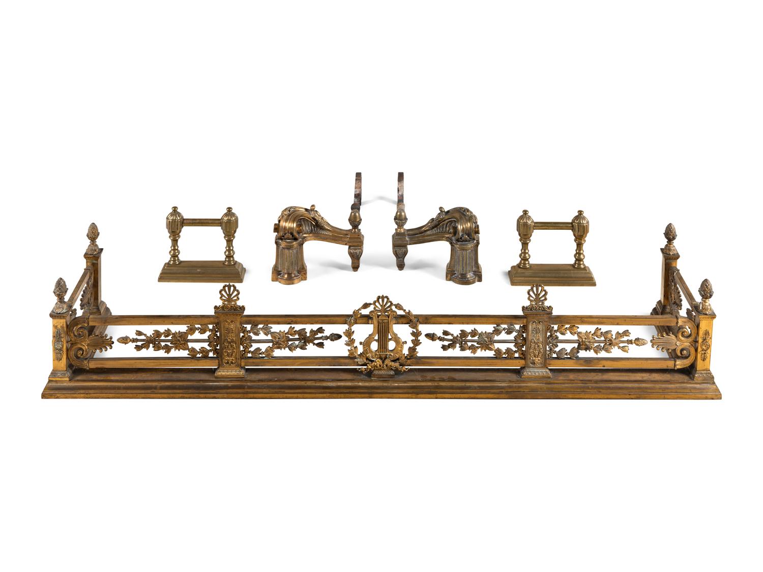 A French Gilt Metal Fireplace Suite