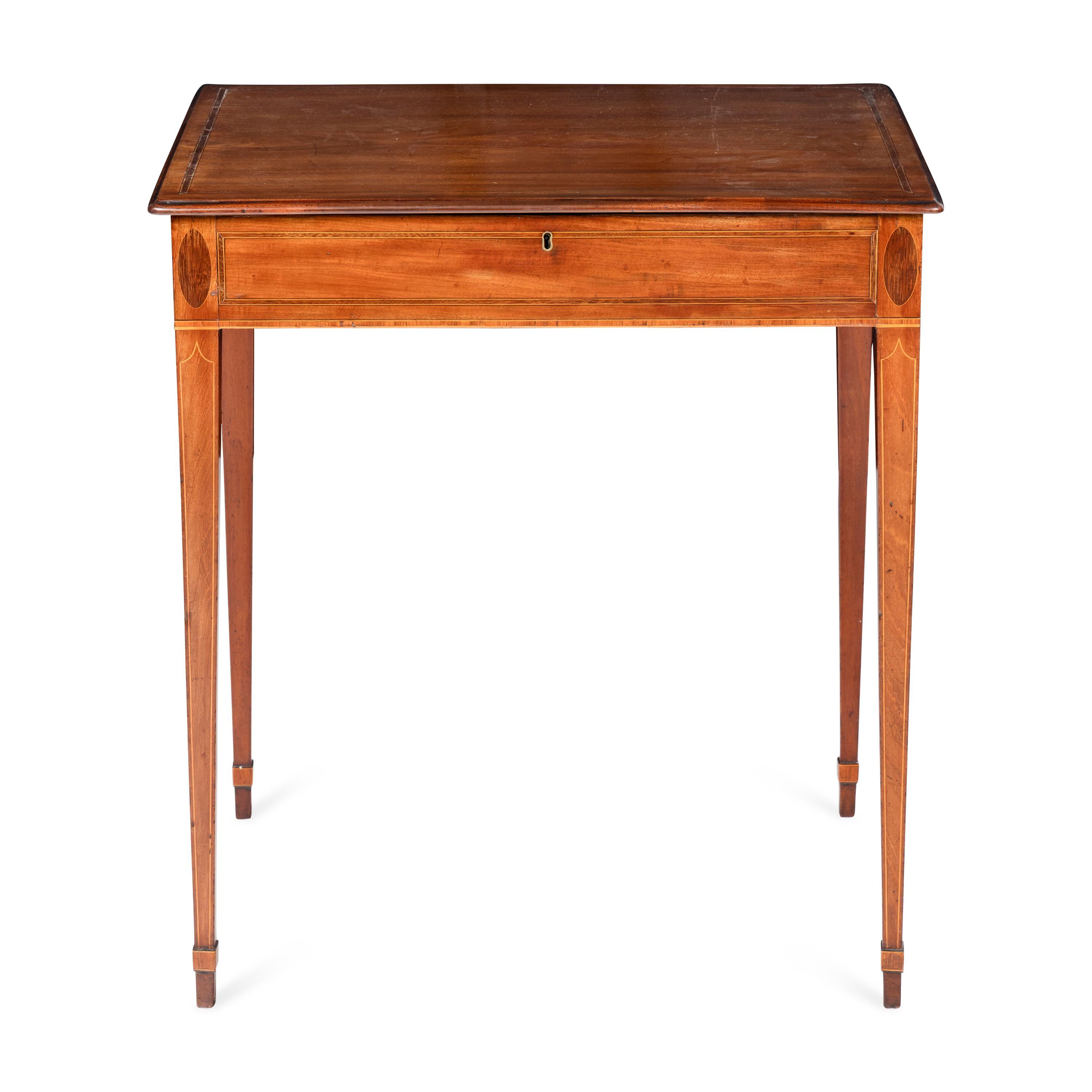 A George III Mahogany Lift-Top Writing Table