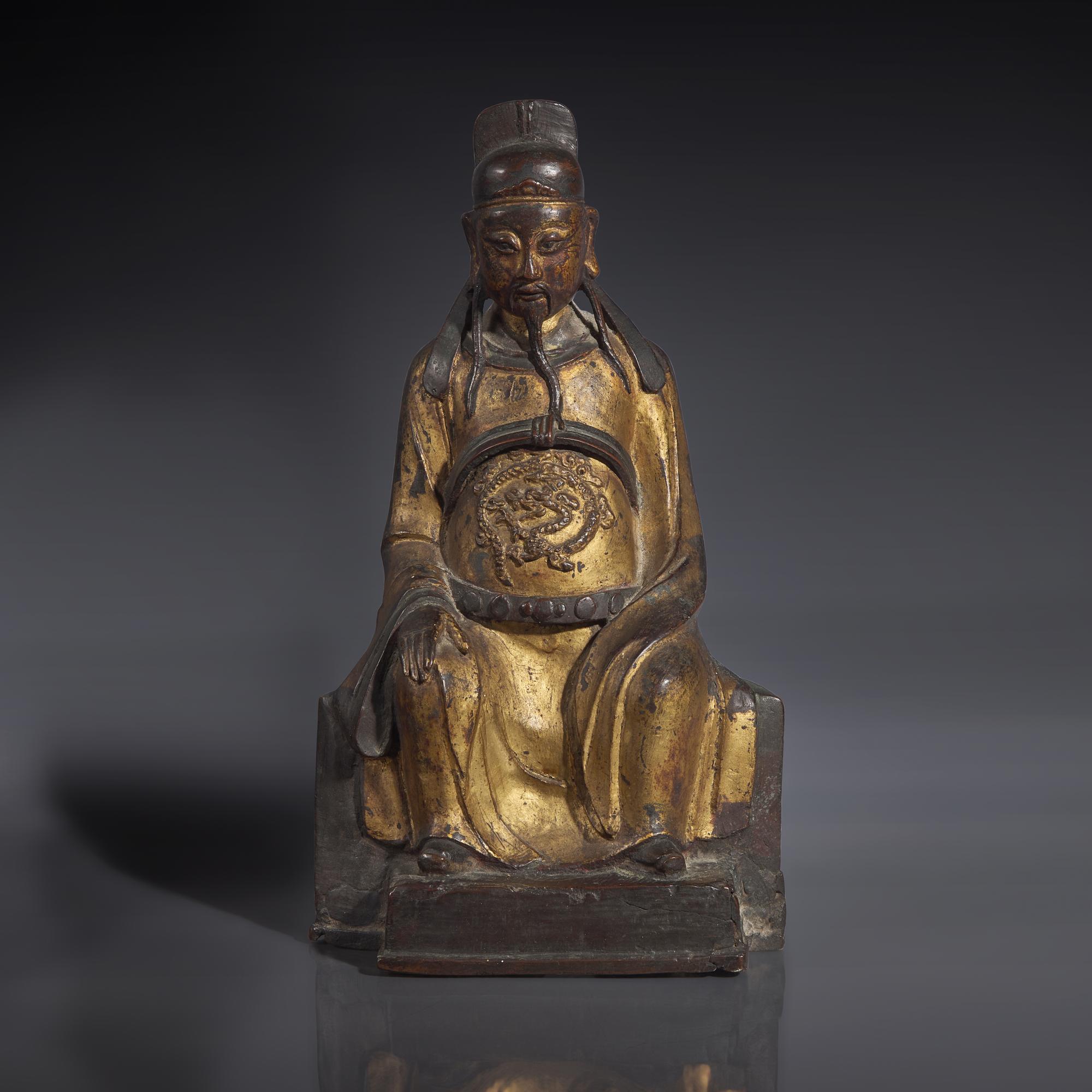 A Chinese Gilt-Lacquered Bronze Figure of a Seated Deity, Ming Dynasty — 明 銅漆金文昌公坐像