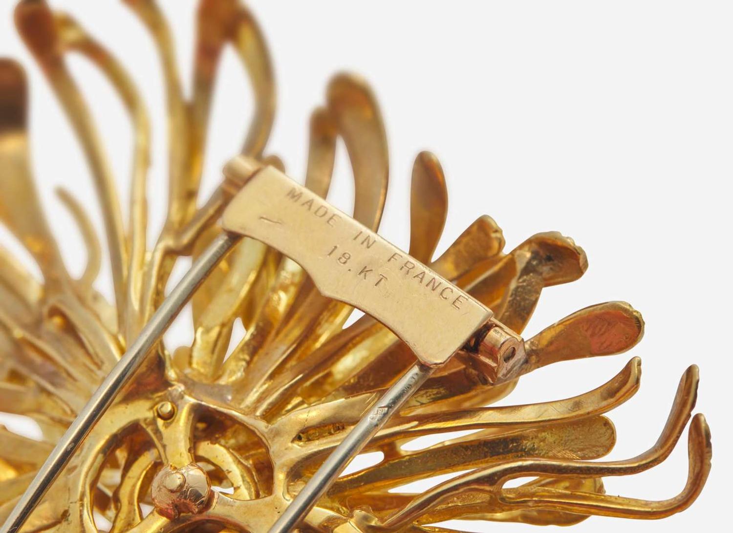 A Group of Three Yellow Gold Retro Brooches