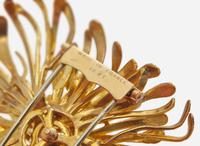 A Group of Three Yellow Gold Retro Brooches
