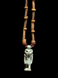 An Egyptian Bead and Faience Necklace with Khnum