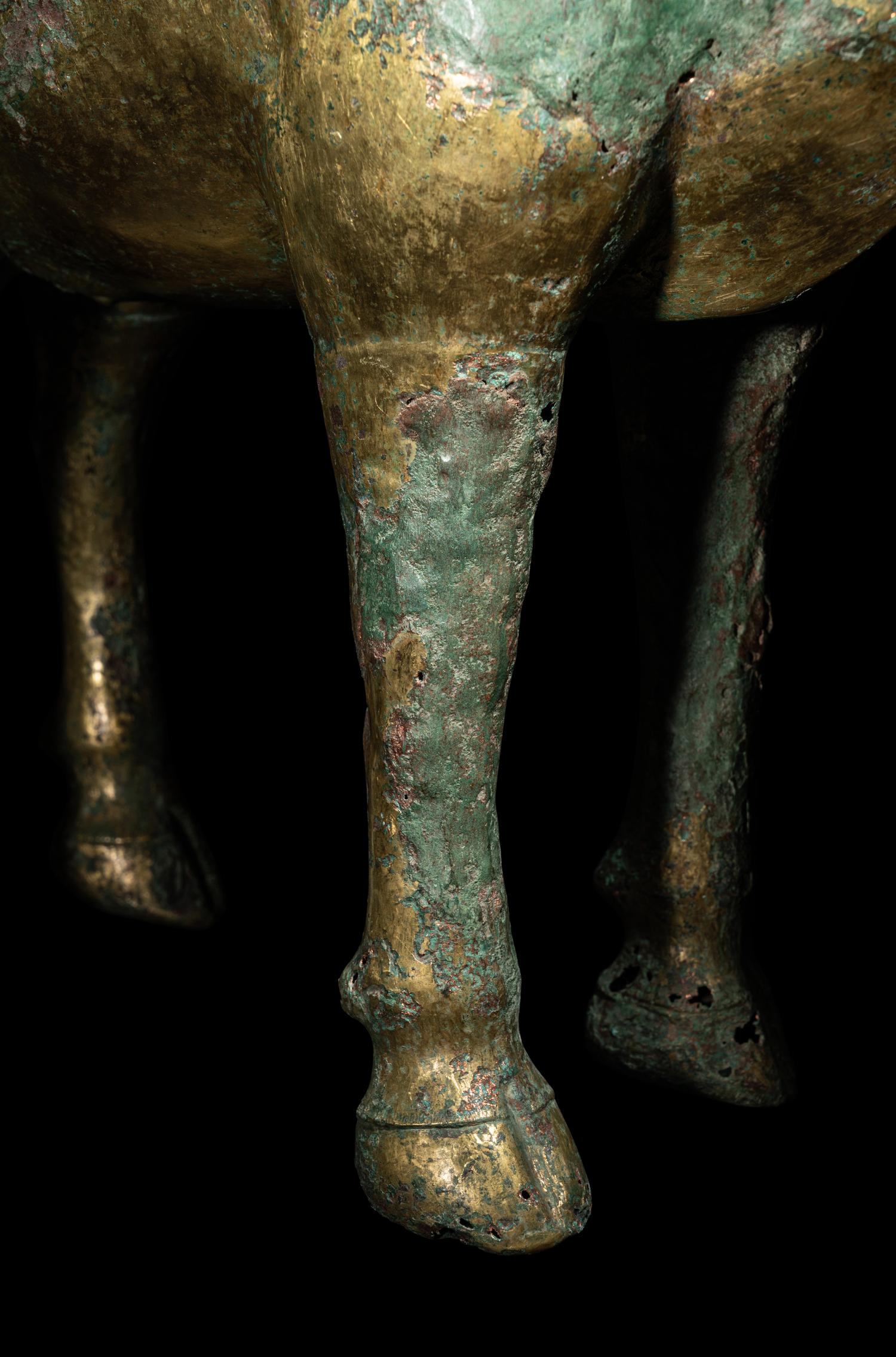 A Gilt Copper Figure of a Bovine
