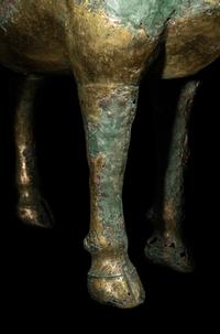 A Gilt Copper Figure of a Bovine