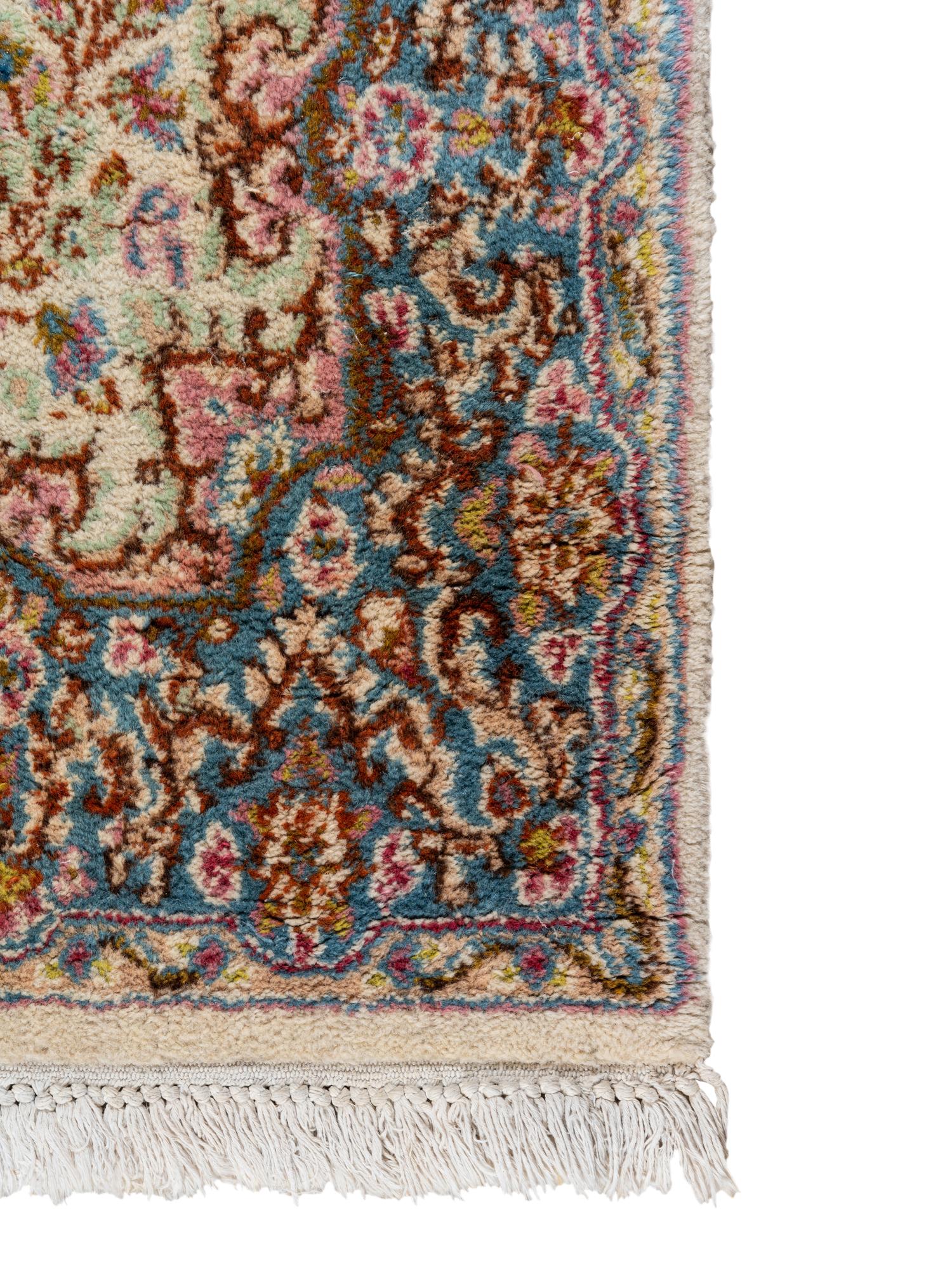 A Kirman Wool Rug