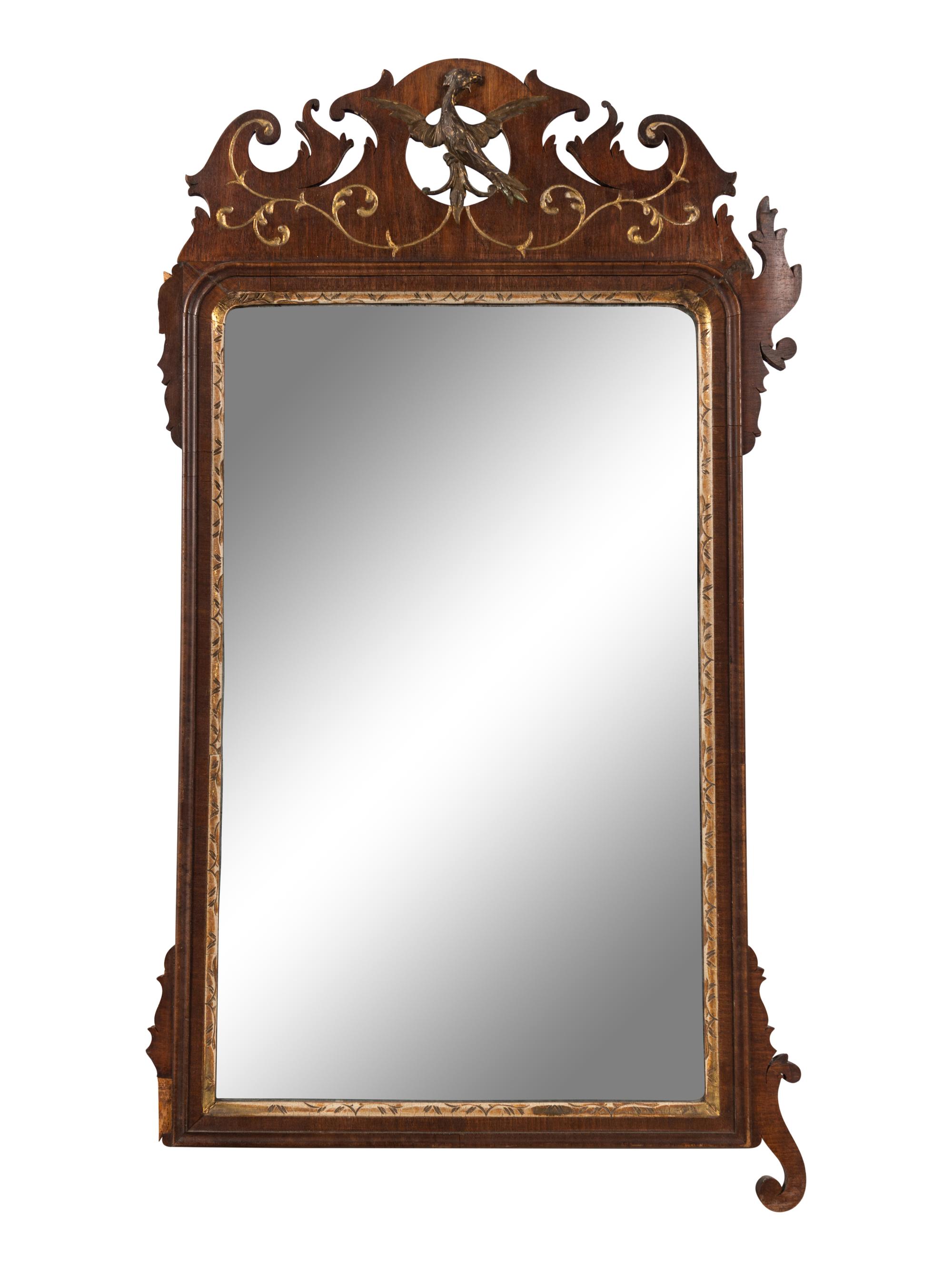 A Chippendale Carved and Parcel Gilt Walnut Looking Glass