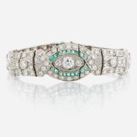 An Art Deco emerald, diamond, and platinum bracelet