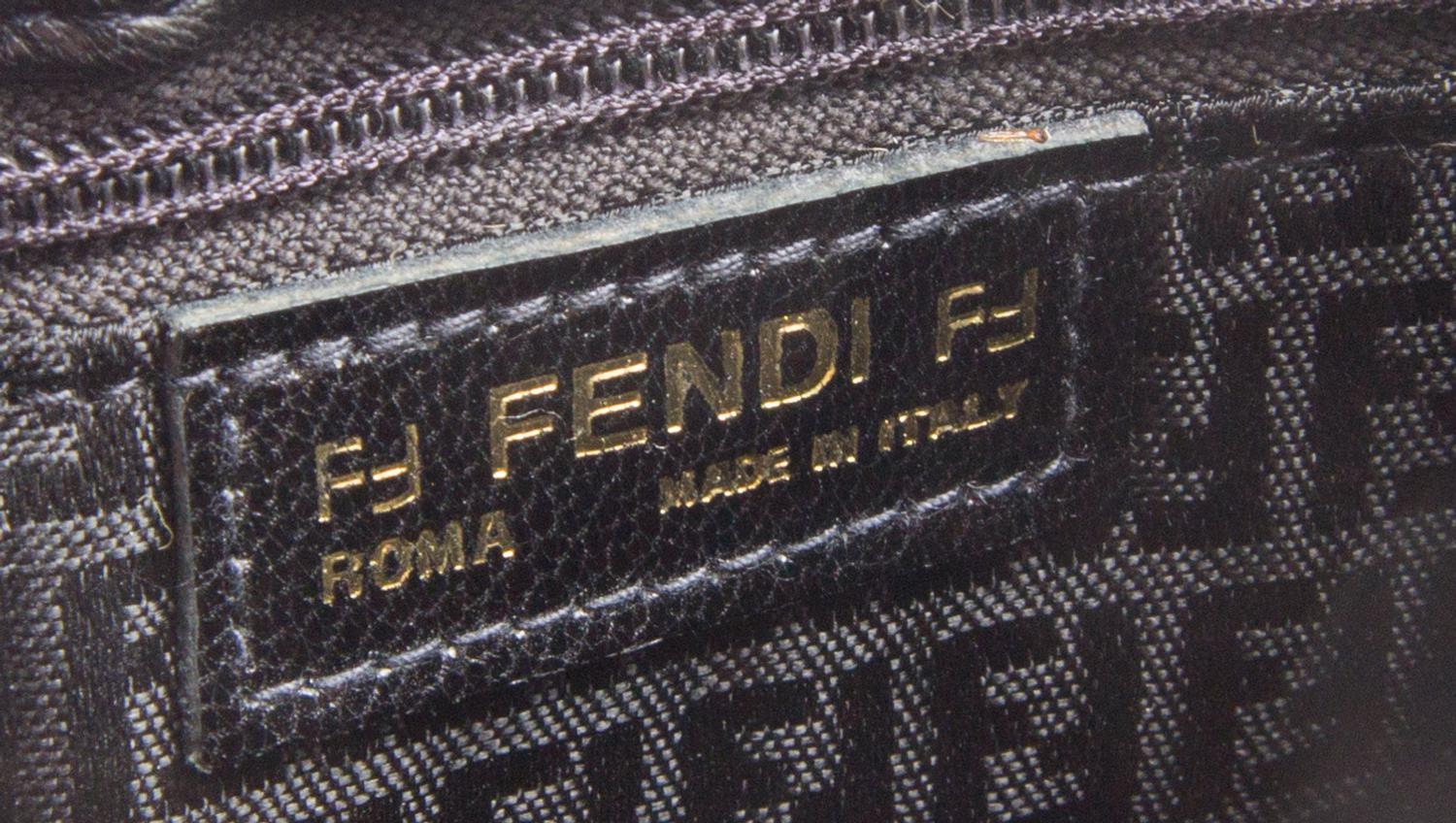 A Fendi Black Leather Crossbody Bag, 8" x 6" x 2".