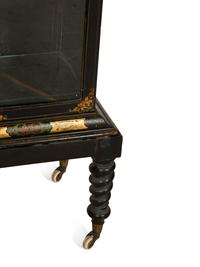 A Victorian Black and Gilt Lacquer Etagère on Stand