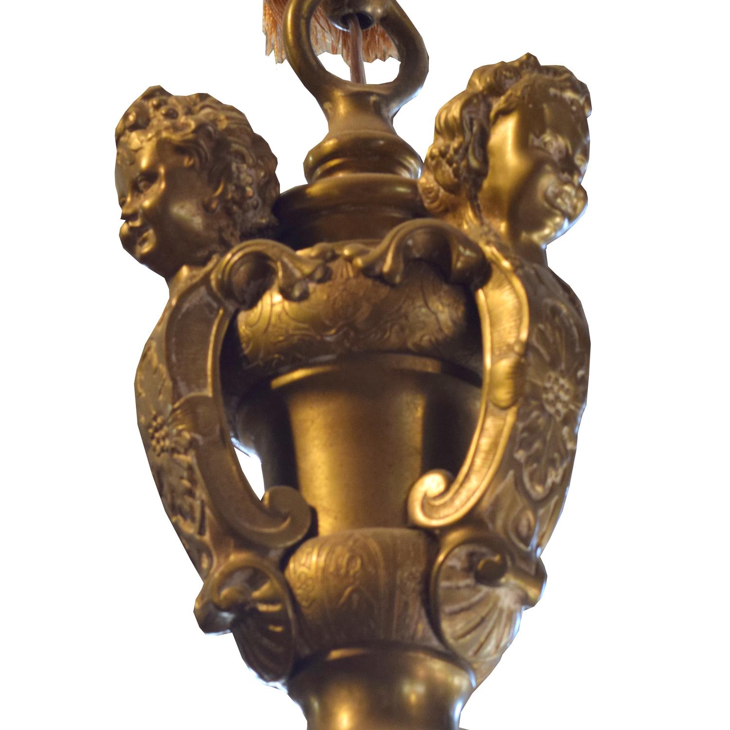 A Pair of Brass Eight Arm Chandeliers 34" W x 34" D x 53" H — United States, Circa 1920