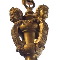 A Pair of Brass Eight Arm Chandeliers 34" W x 34" D x 53" H — United States, Circa 1920