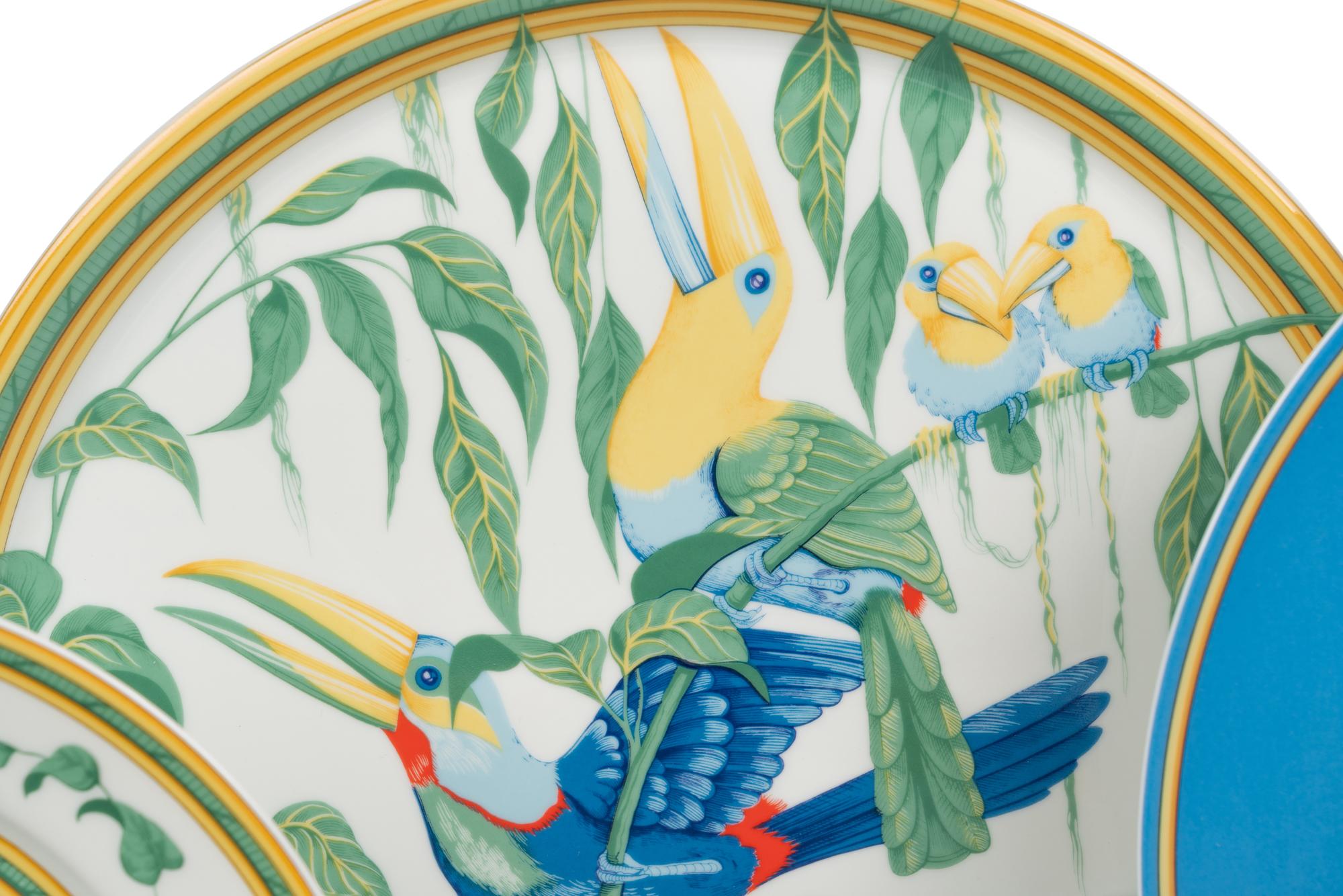 An Hermès Toucans Porcelain Dinner Service