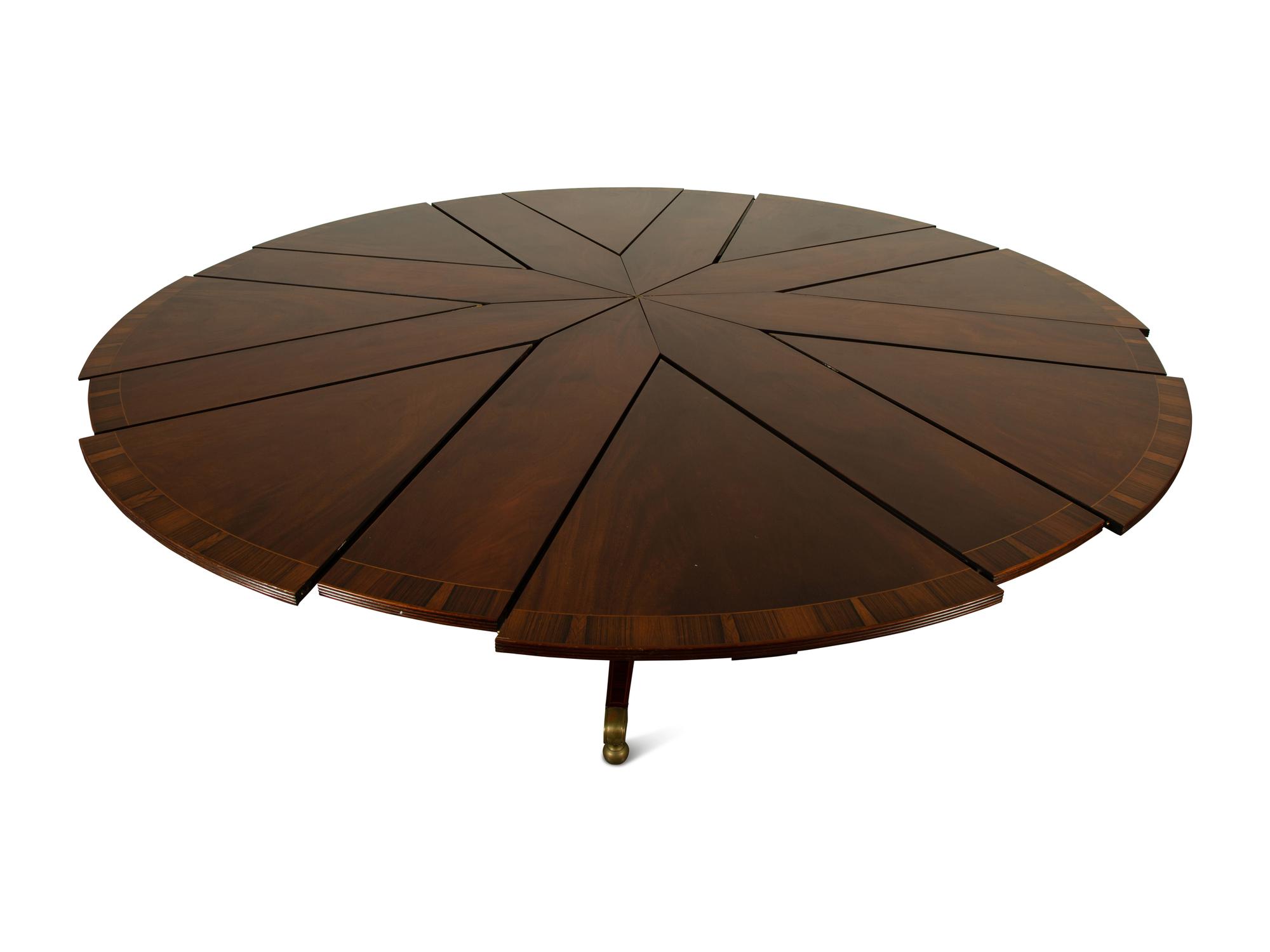 A Regency Style Mahogany "Jupe" Metamorphic Dining Table — 20TH CENTURY