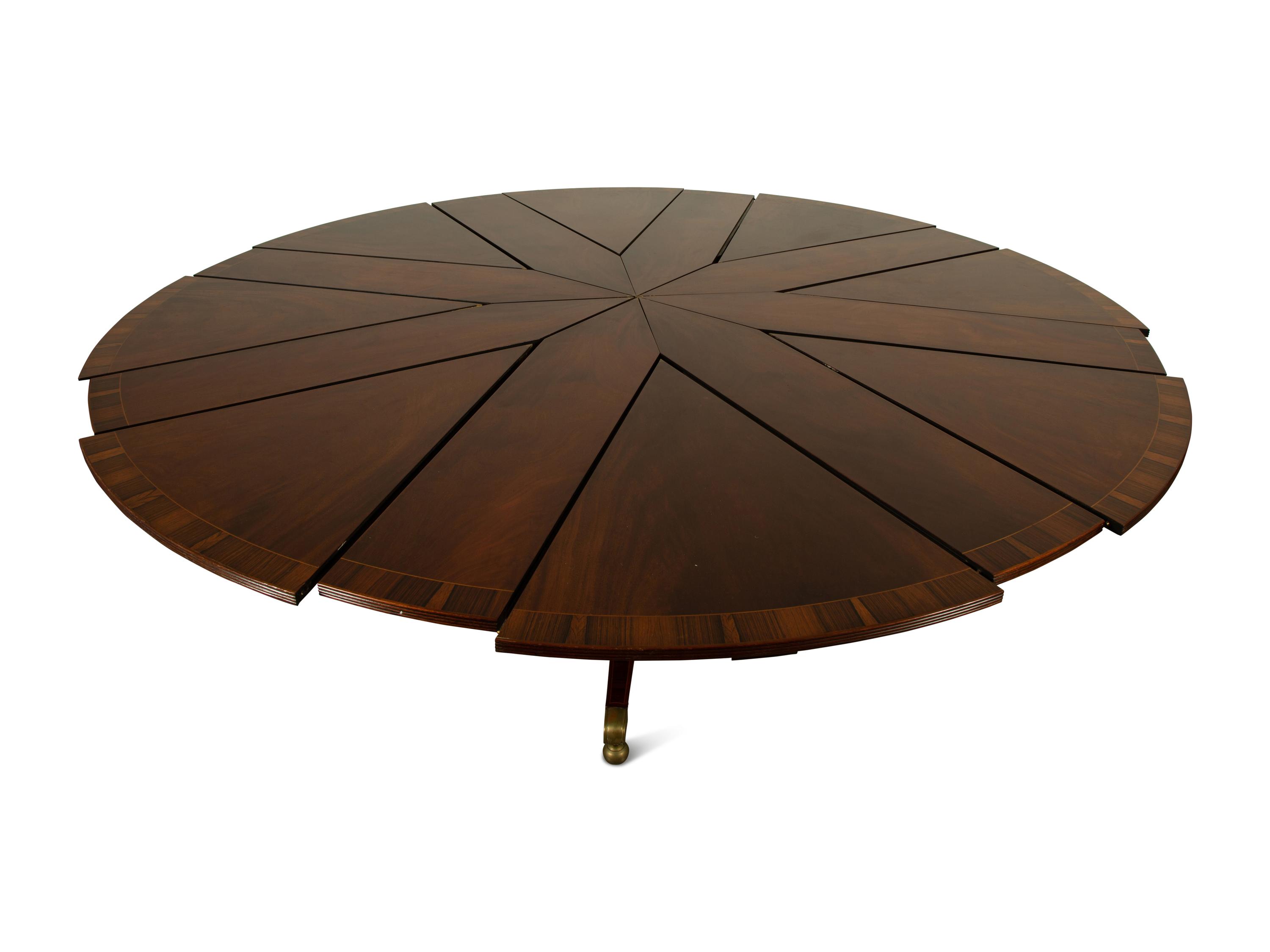 A Regency Style Mahogany "Jupe" Metamorphic Dining Table — 20TH CENTURY
