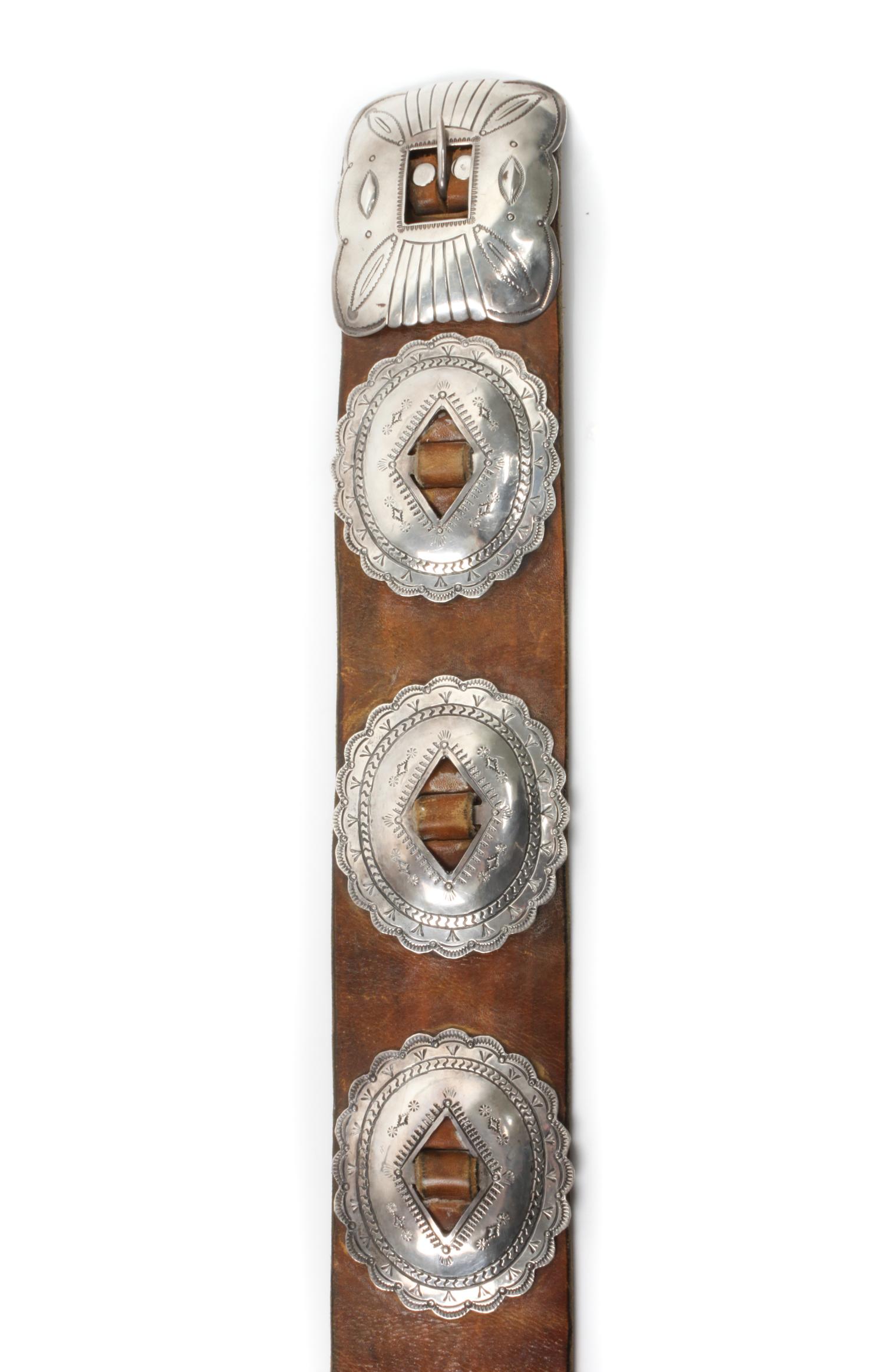 A Navajo Silver First Phase Revival Concho Belt Length overall 43 1/2 inches.